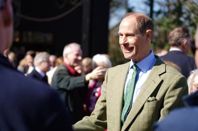 Duke of Edinburgh goes behind the scenes at zoo to prepare gorilla food