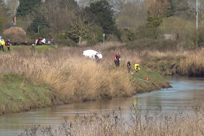 Body of teenage girl recovered after car plunged into river