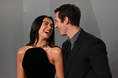 Dua Lipa and Callum Turner lead couples on red carpet at Vanity Fair Oscar Party