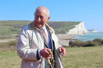 King opens longest managed coastal walking route in the world