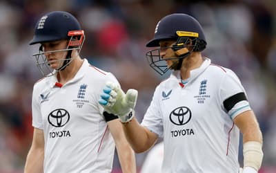 Root and Brook put England on top before weather ends first day early