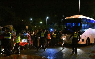 Iranian women's football team signal 'SOS' from bus amid safety fears