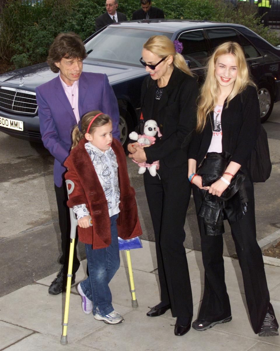 Mick Jagger with ex-wife Jerry Hall, daughters Elizabeth (eldest), Georgia (on crutches) and son James