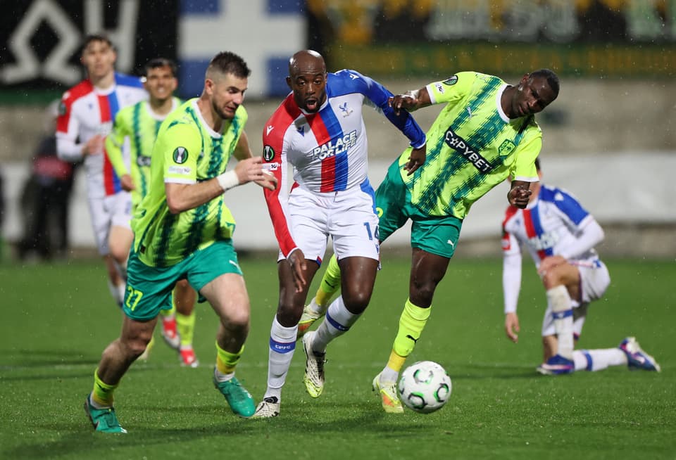 Soccer Football - UEFA Conference League - Round of 16 - Second Leg - AEK Larnaca v Crystal Palace - AEK Arena, Larnaca, Cyprus - March 19, 2026 Crystal Palace's Jean-Philippe Mateta in action with AEK Larnaca's Valentin Roberge REUTERS/Yiannis Kourtoglou